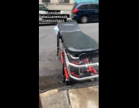 Collab WINY - Random hospital gurney bed on the street