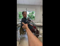 Guy does secret handshake and flips desk over