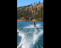 Woman kneeboard ride waves then fall down