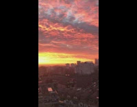 Beautiful sunset sky over city rooftop view