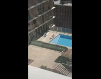 Buff guy striped shorts  pool chair sunny