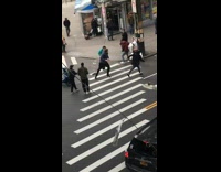 Guy gets in a fight, hits man with stick, trips and falls, then gets beat up with said stick