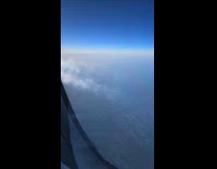 Jet engine exhaust steam seen on window