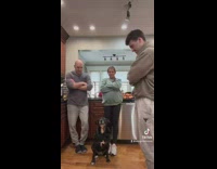 Smart black dog says prayer for family 