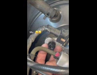 Guy uses fingers to tighten nut bolt 