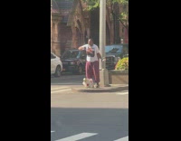 Guy dances in middle of street 