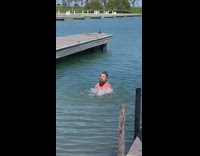 Guy beard swim shake lake water ramp