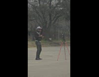 Man cowboy dances with red sports car