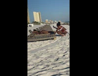 Lady in Pink Bikini Lays on Belly for Beach Photos Part 2