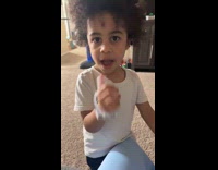 Woman using device preventing toddler from thumbsucking