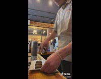 Fake cake prank with grounded coffee beans at cafe