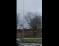 Tall metal pole moves back and forth 