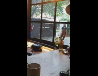 Girl black shirt handbag window blue window