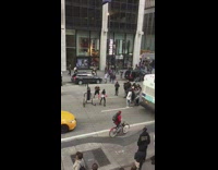 Boxing jump punching bag middle busy street