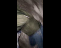 Man struggles to climb the frozen hill