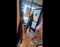 Excited guy shouts as Grimace mascot arrives