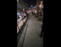 Man piggyback ride woman fell down sidewalk