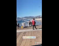 Guy sings dances beach pier space uber 