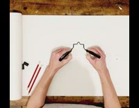 Person drawing a flower with both hands at same time
