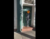 Two women on their Halloween costume at the sidewalk