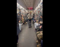 Two men dances inside the subway train Part 2