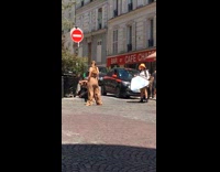 Brown jumpsuit girl poses street phone camera 