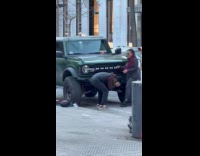 Couple tries to photoshoot on random car
