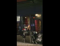 Blonde Woman Dances in Store Window 