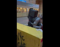 Delivery driver guy passed out on scooter