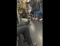 Guy puts brown hat on rat costume 