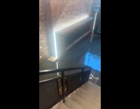 Collab WINY - Flooded apartment lobby entrance below the stairs