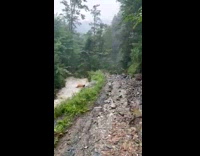Road Looks Like Rapids Due to Flood
