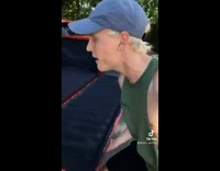 Guy cant close orange truck trunk door