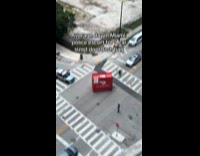 Police car escorting doordash bag car