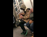 Woman uses lid to eat ice cream