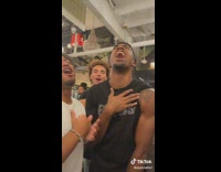 Group of guys sing the weekend song