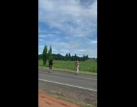 Two people video shoot while in hoverboard