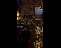 Halloween decorations with string lights outside house