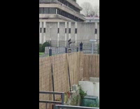 Woman raise foot railings photo shoot sortie