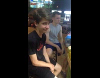 Boy makes funny face waits for food