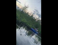 Guy yellow rowboat throws can at friend 