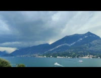 Timelapse storm clouds over lake como mountain
