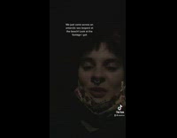 Girl finds sea leopard laying on beach shines light on it 