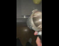 Guy grinds coffee and gets stuck at machine