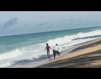 Woman red tank top beach waves fall fail