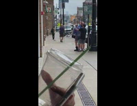Guy walks with two walking sticks 