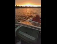 Sunset view on the boat at the ocean