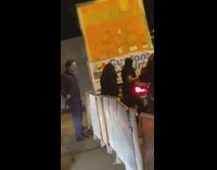 Nun selfie with Michael Myers car night