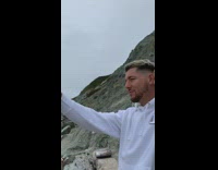 Couple hug pose beach face mask overcast