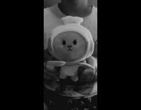 Guy stuffed animal toy air drums spoon